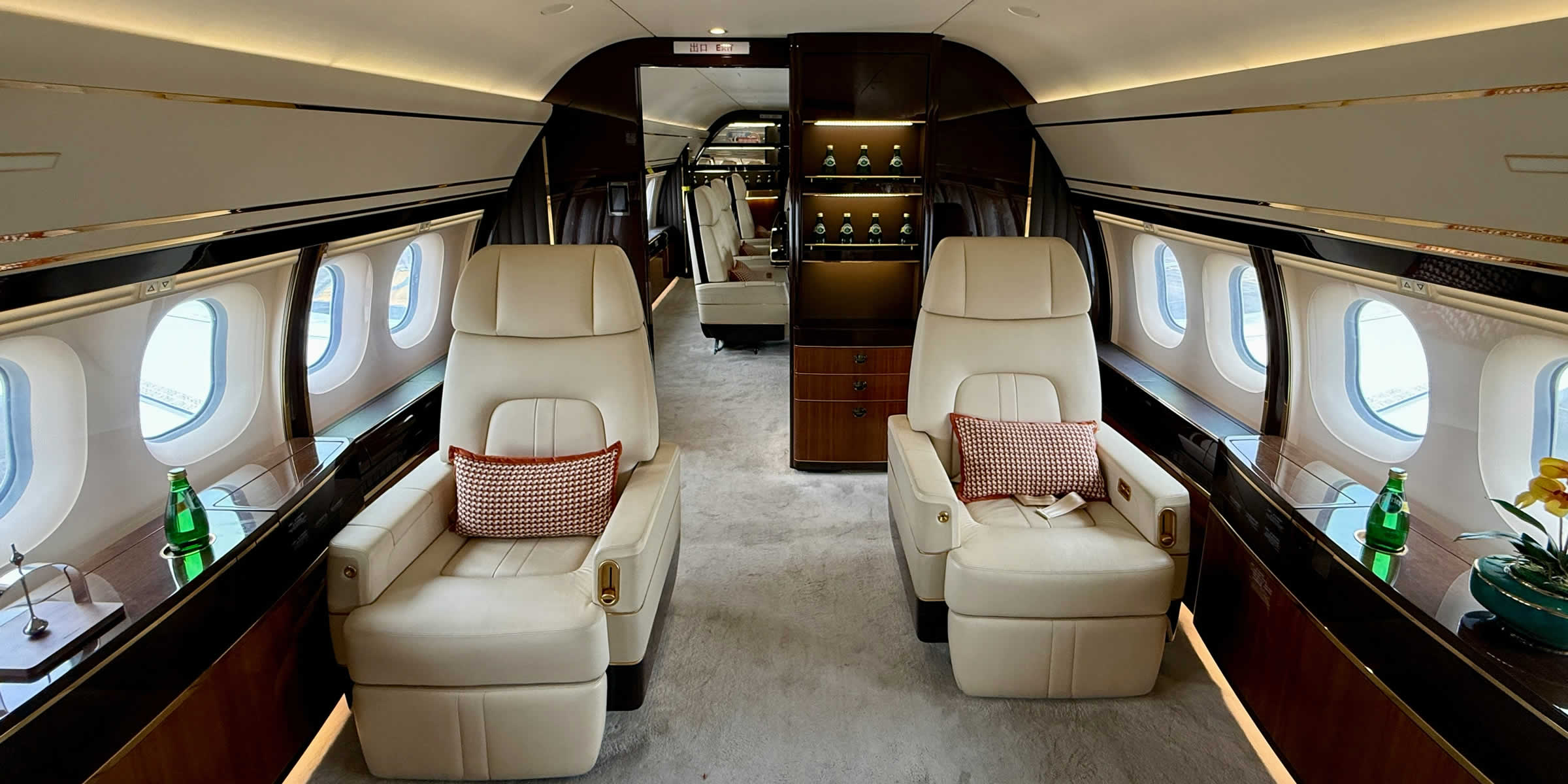 Private jet cabin interior with leather seating